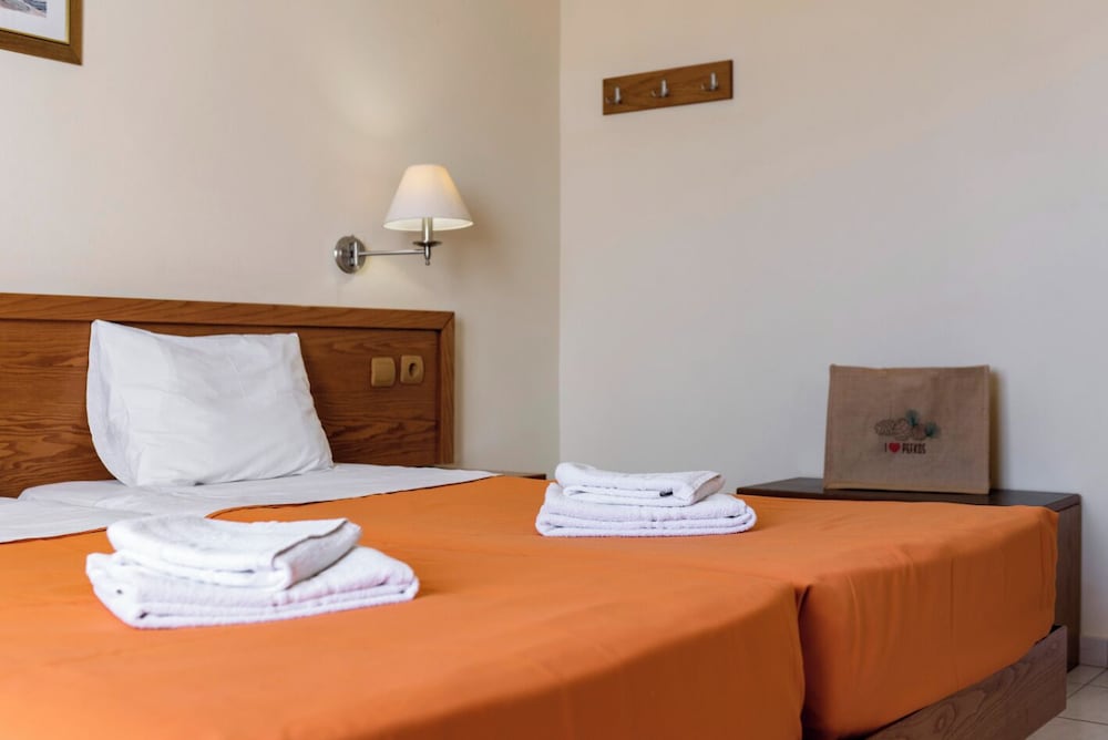 Stella Hotel — Hotel rooms in Pefkos, South Aegean