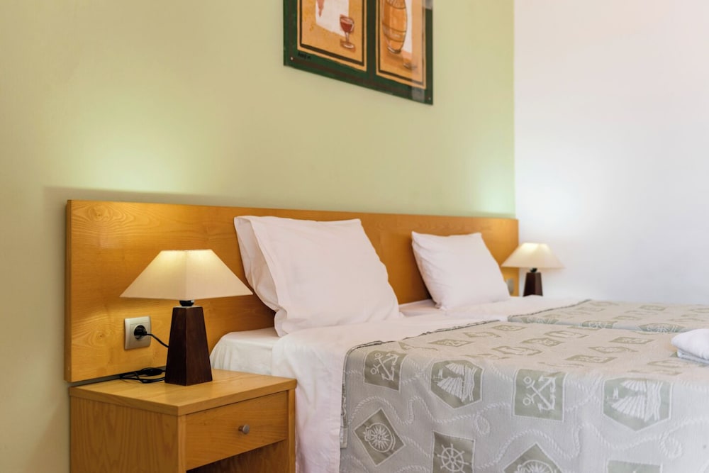 Stella Hotel — Hotel rooms in Pefkos, South Aegean