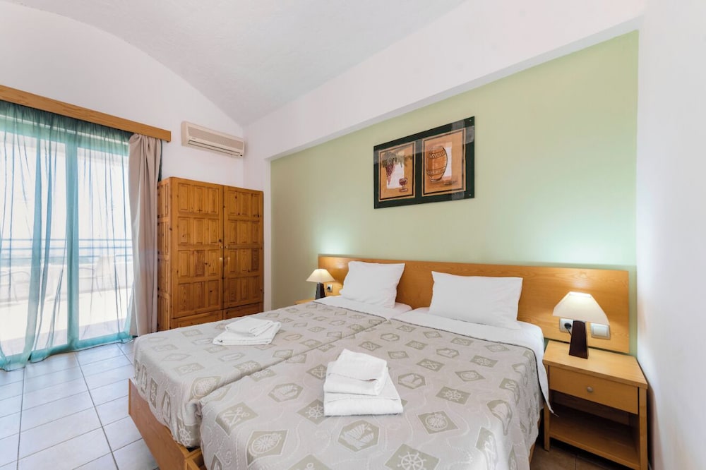 Stella Hotel — Hotel rooms in Pefkos, South Aegean