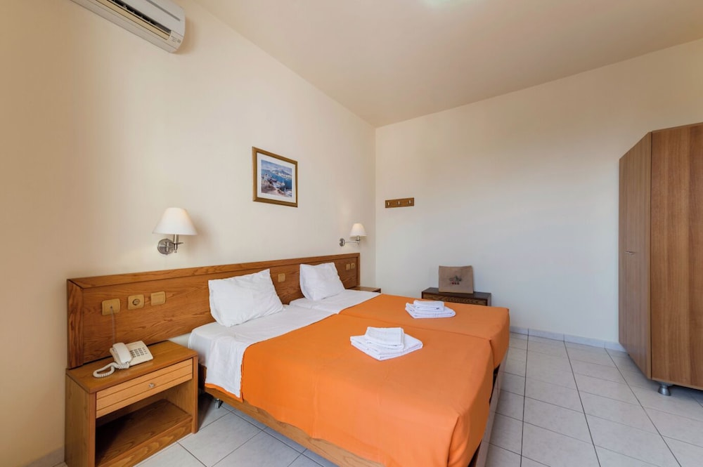 Stella Hotel — Hotel rooms in Pefkos, South Aegean