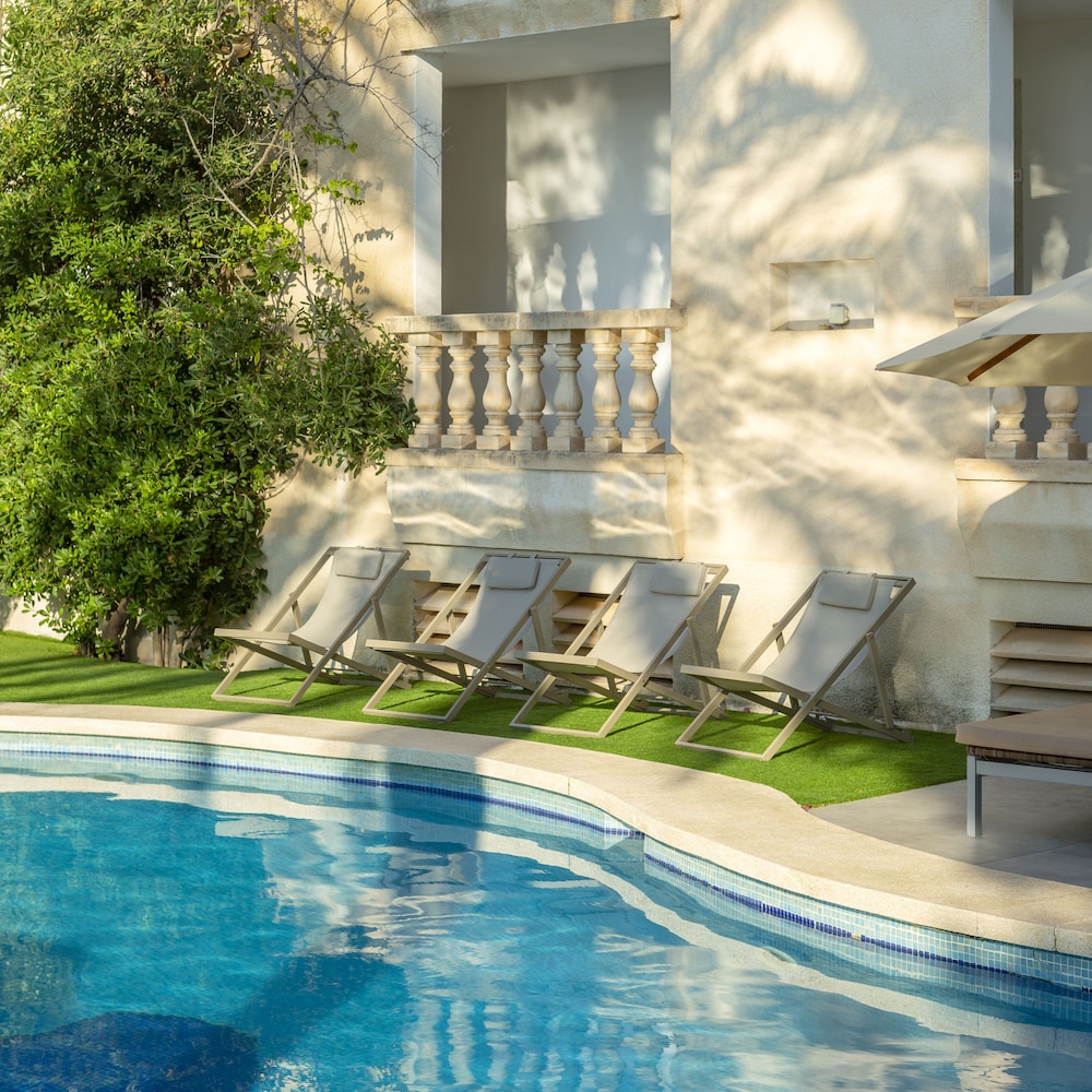 Es Baulo Petit Hotel — Swimming pool in Can Picafort, Balearic Islands
