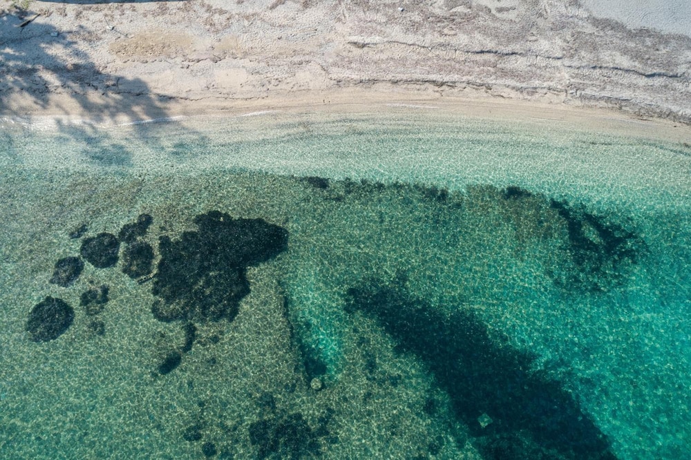Bella Vista Beach Hotel and Studios — Beach in Benitses, Ionian Islands