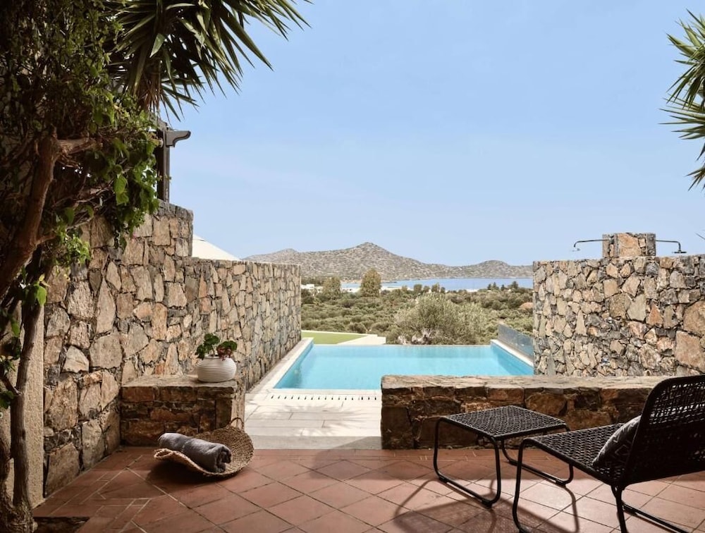 Elounda Palm Hotel — Swimming pool in Elounda