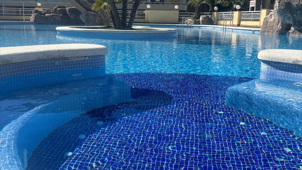 Evenia Olympic Palace — Swimming pool in Lloret de Mar, Catalonia