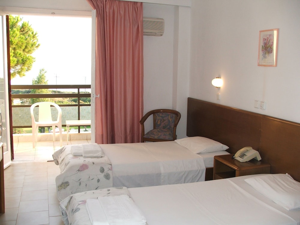 Irinna Hotel — Hotel rooms in Svoronata, Ionian Islands