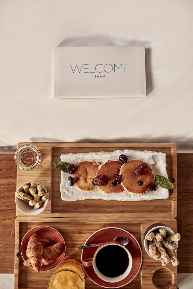 Kouros Hotel & Suites — Hotel rooms in Mykonos Town, South Aegean