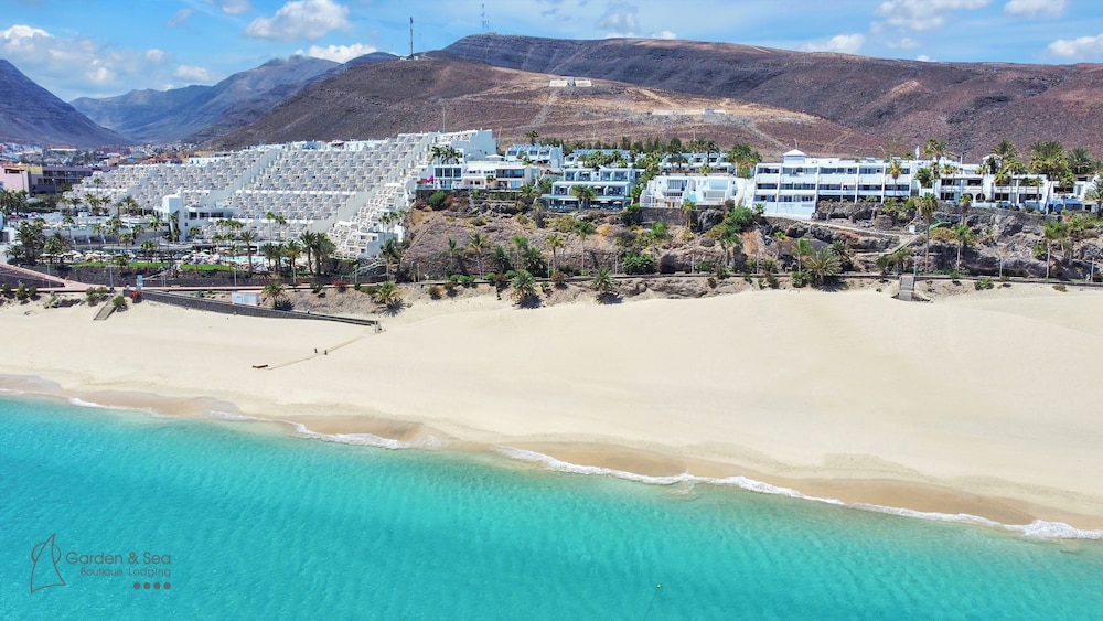 Apartamentos Garden & Sea Boutique Lodging by LIVVO — Beach in Esquinzo, Canary Islands
