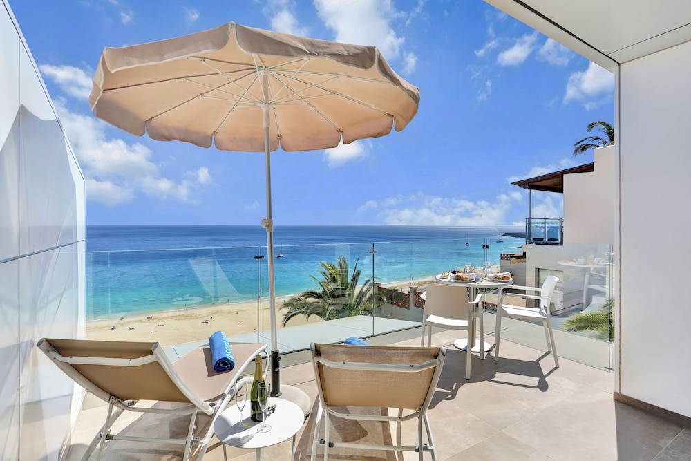 Apartamentos Garden & Sea Boutique Lodging by LIVVO — Beach in Esquinzo, Canary Islands