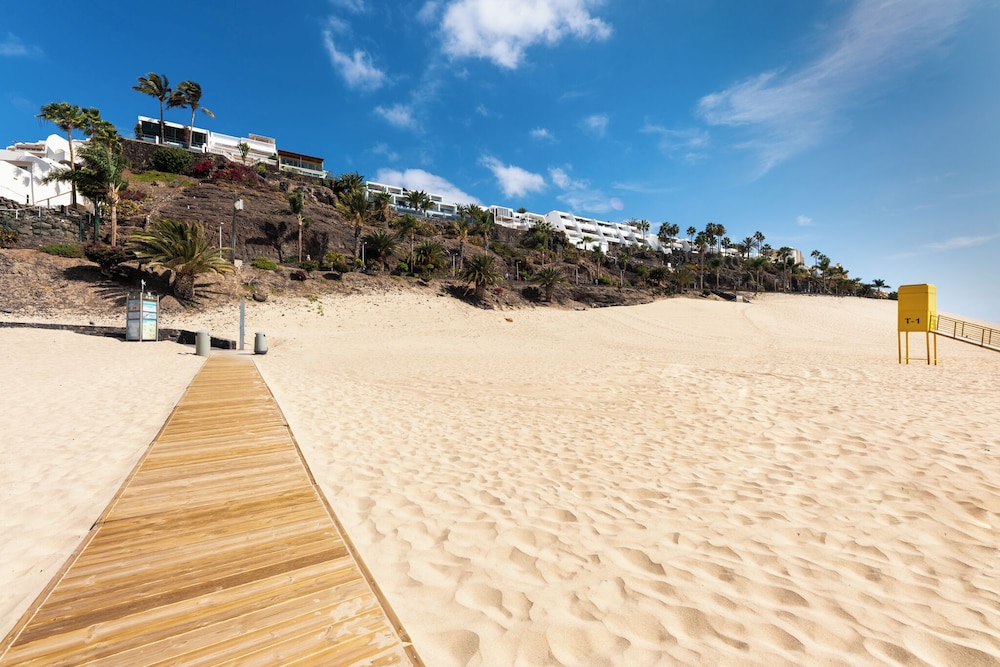 Apartamentos Garden & Sea Boutique Lodging by LIVVO — Beach in Esquinzo, Canary Islands
