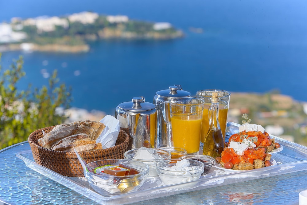 Nymphes Luxury Apartments — Restaurant & bars in Lygaria