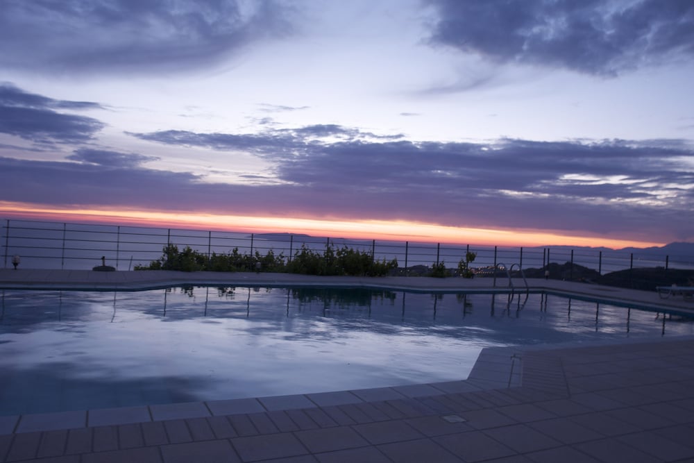 Nymphes Luxury Apartments — Swimming pool in Lygaria