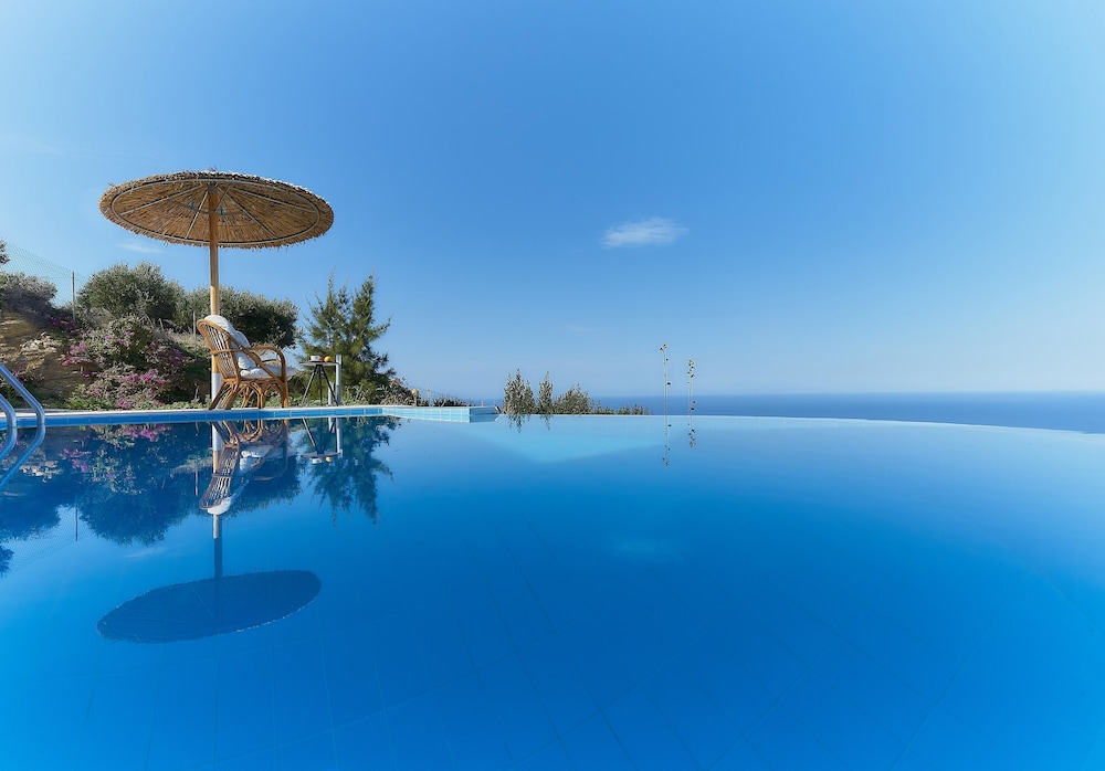 Nymphes Luxury Apartments — Swimming pool in Lygaria