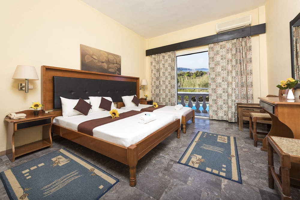 Potamaki Beach Hotel — Hotel rooms in Benitses, Ionian Islands