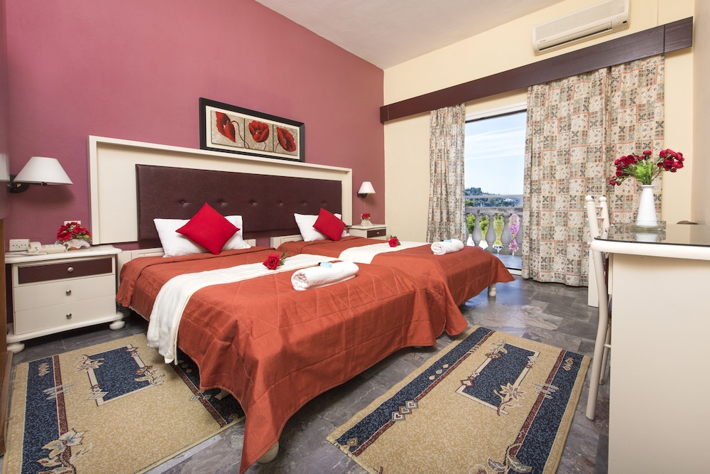 Potamaki Beach Hotel — Hotel rooms in Benitses, Ionian Islands