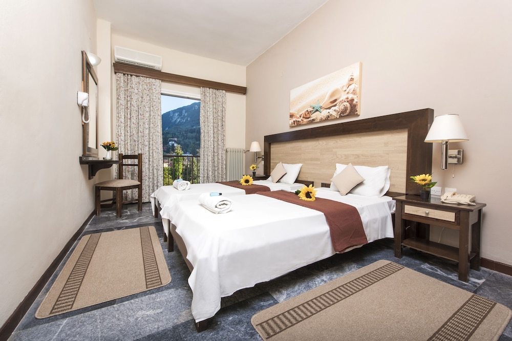 Potamaki Beach Hotel — Hotel rooms in Benitses, Ionian Islands