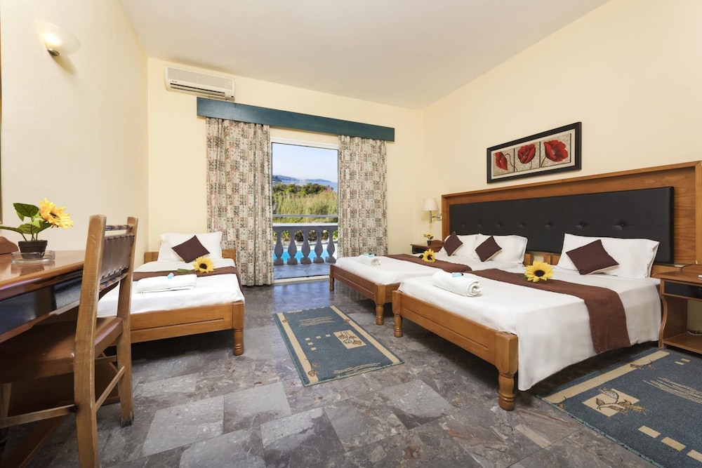 Potamaki Beach Hotel — Hotel rooms in Benitses, Ionian Islands