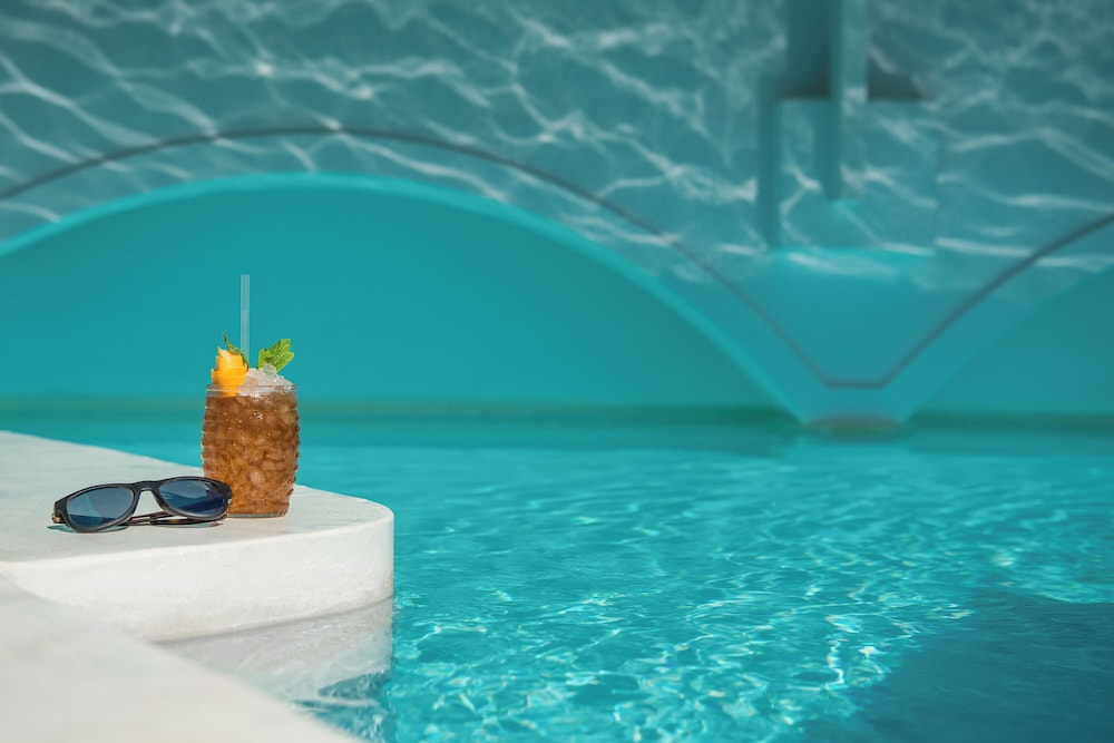 On The Rocks Hotel — Swimming pool in Imerovigli, South Aegean
