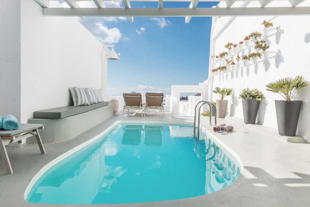 On The Rocks Hotel — Swimming pool in Imerovigli, South Aegean