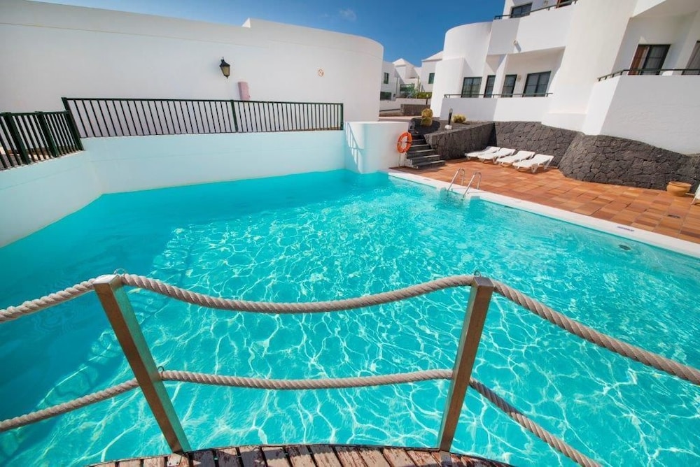 Apartamentos Lanzarote Paradise — Swimming pool in Costa Teguise, Canary Islands