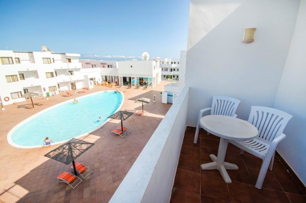 Apartamentos Lanzarote Paradise — Swimming pool in Costa Teguise, Canary Islands