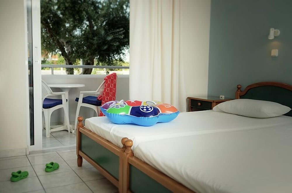 Marianna Hotel — Hotel rooms in Tigaki, South Aegean