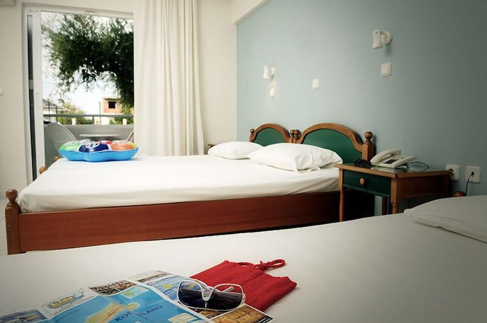 Marianna Hotel — Hotel rooms in Tigaki, South Aegean