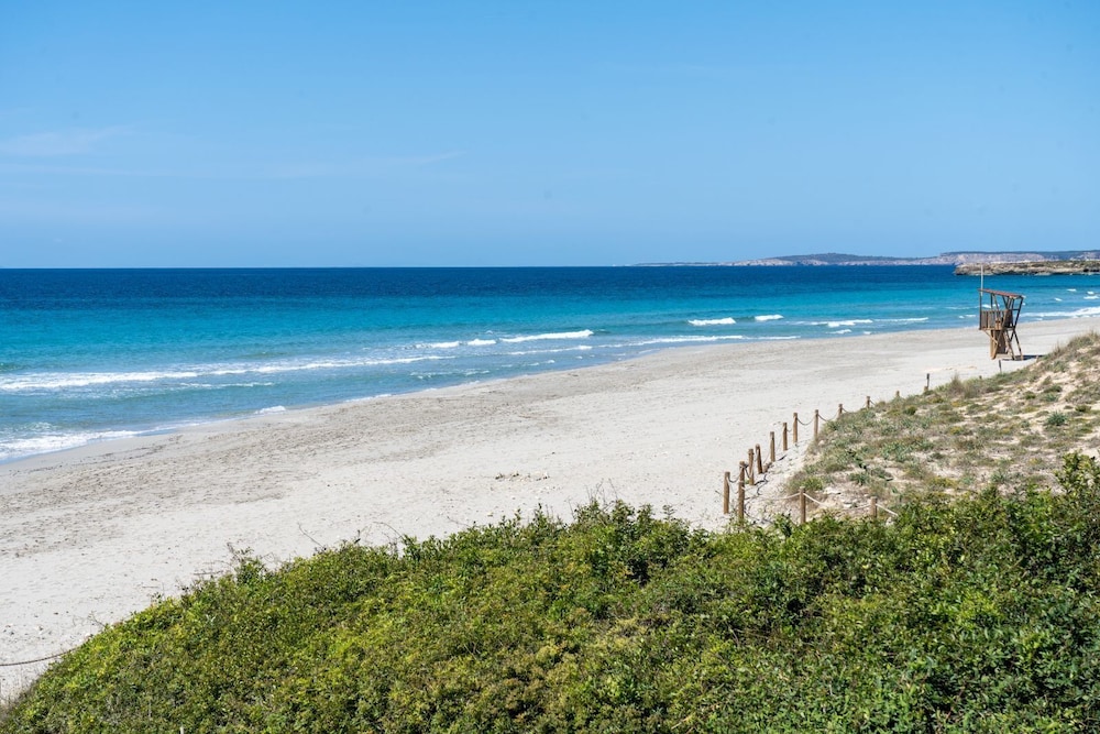 Apartamentos Seth Mestral y Llebeig — Beach in Santo Tomas, Balearic Islands