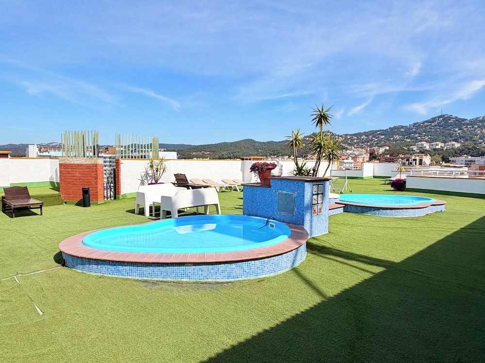 Hotel Xaine Park — Swimming pool in Lloret de Mar, Catalonia