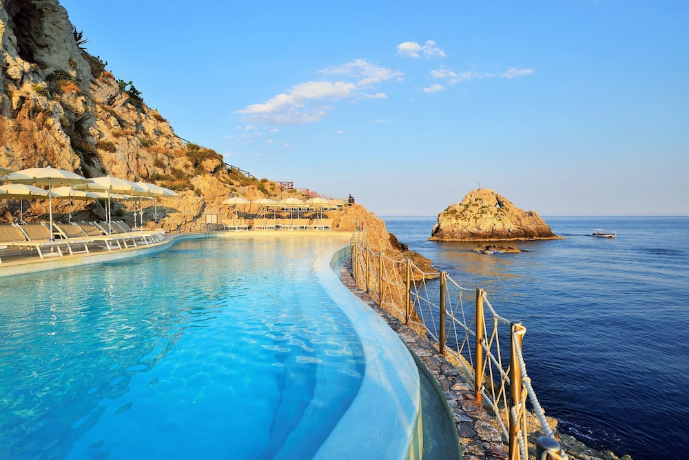 UNA Hotels Capotaormina — Swimming pool in Taormina, Sicily