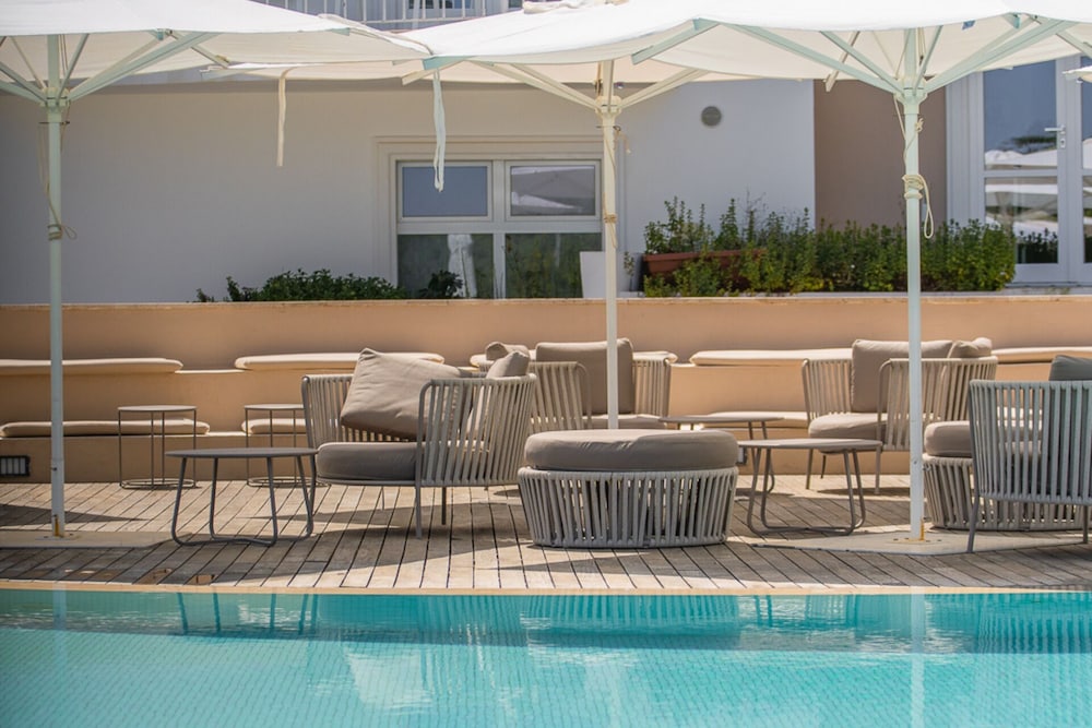Felix Hotels - Hotel La Coluccia — Swimming pool in Conca Verde, Sardinia