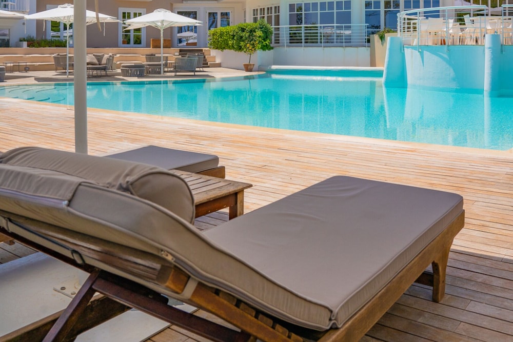Felix Hotels - Hotel La Coluccia — Swimming pool in Conca Verde, Sardinia