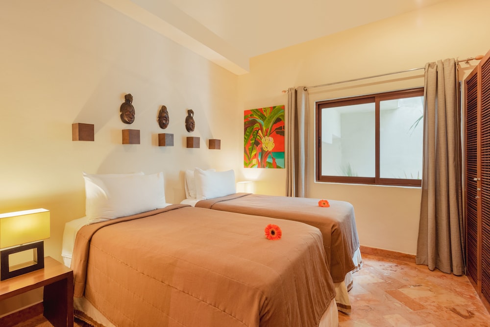 Porto Playa Condo Hotel & Beachclub — Hotel rooms in Playa del Carmen, Quintana Roo