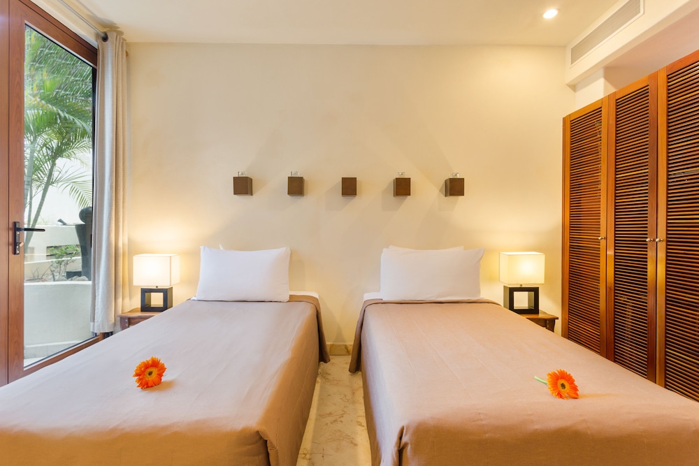 Porto Playa Condo Hotel & Beachclub — Hotel rooms in Playa del Carmen, Quintana Roo