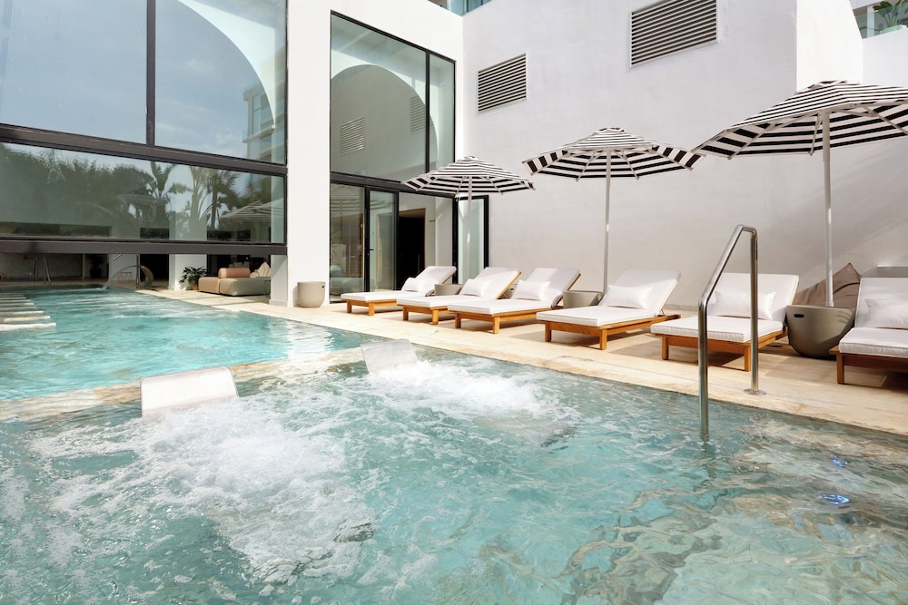 BLESS Ibiza Cala Nova - The Leading Hotels of the World — Swimming pool in Santa Eulalia, Balearic Islands