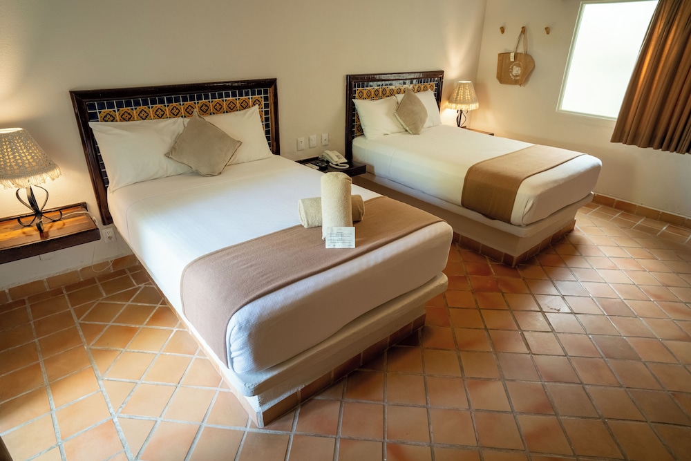 Petit Lafitte Beachfront Hotel & Bungalows — Hotel rooms in Playa del Carmen, Quintana Roo