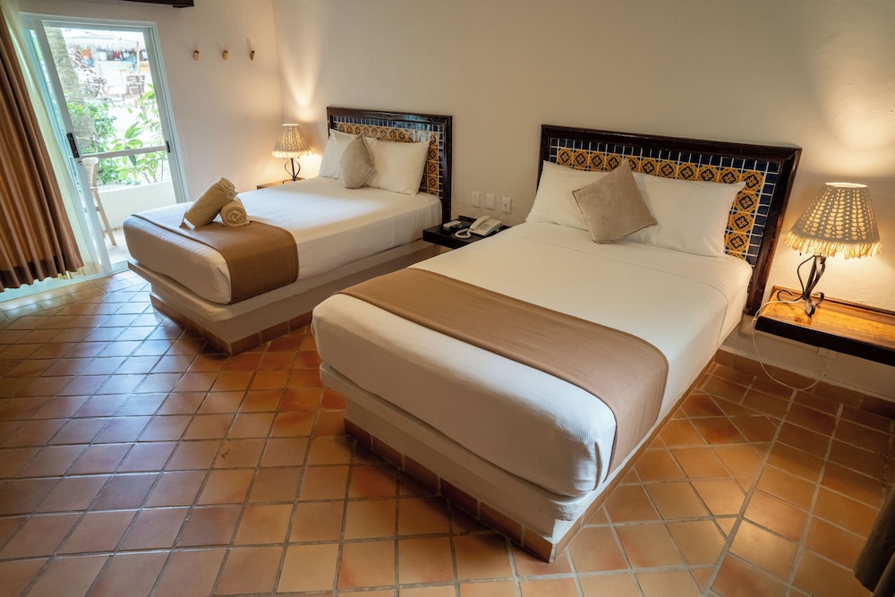 Petit Lafitte Beachfront Hotel & Bungalows — Hotel rooms in Playa del Carmen, Quintana Roo