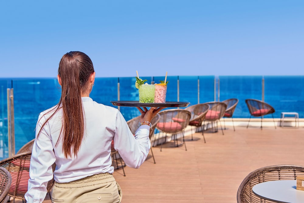 Universal Hotel Perla — Restaurant & bars in Sa Coma, Balearic Islands