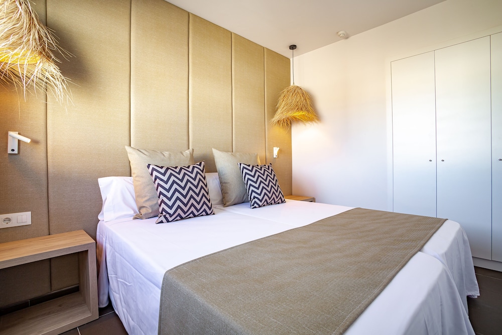 Migjorn Ibiza Suites & Spa — Hotel rooms in Playa d'en Bossa, Balearic Islands