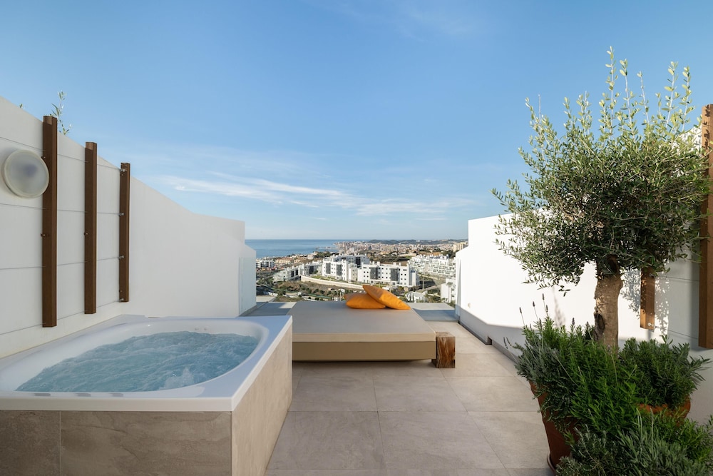 Higueron Hotel Malaga, Curio Collection by Hilton — Swimming pool in Fuengirola, Andalusia