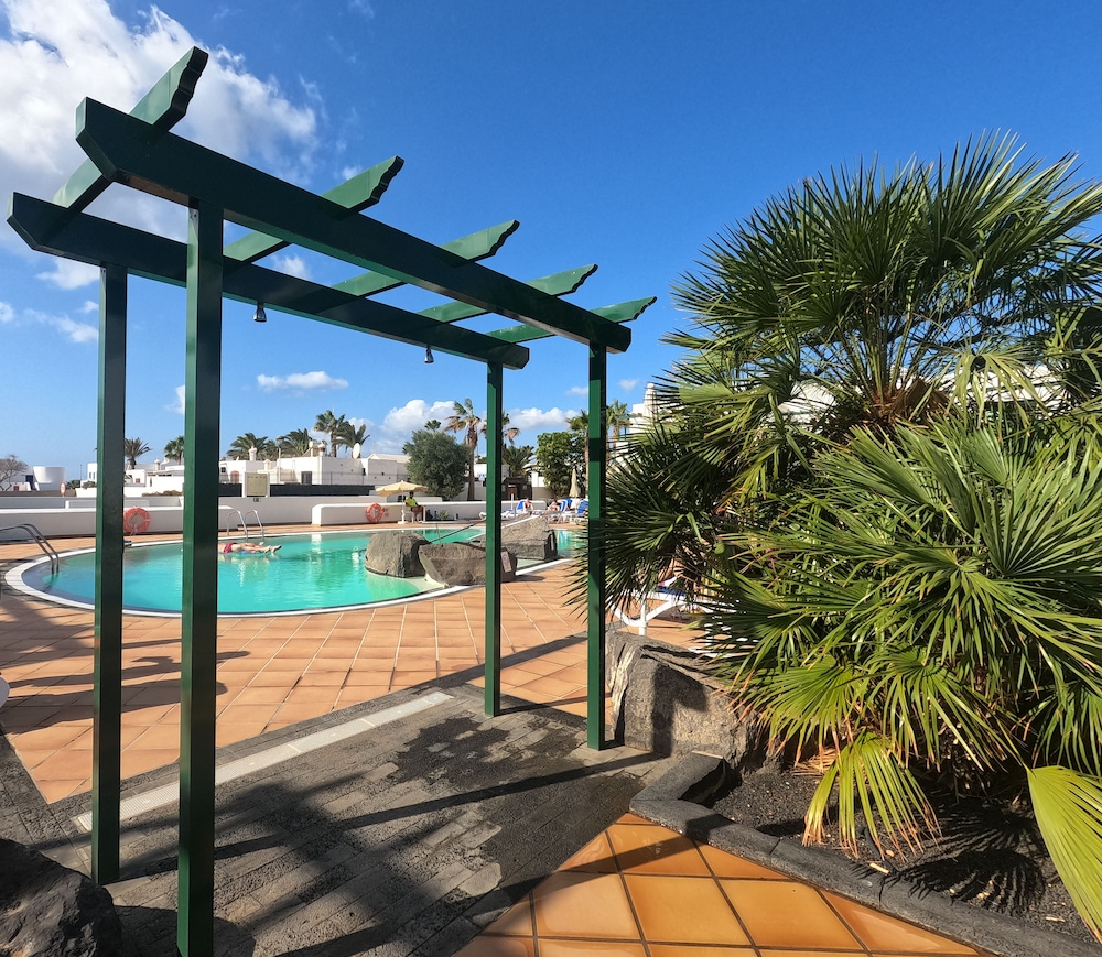 Hotel Pocillos Playa — Swimming pool in Puerto del Carmen, Canary Islands