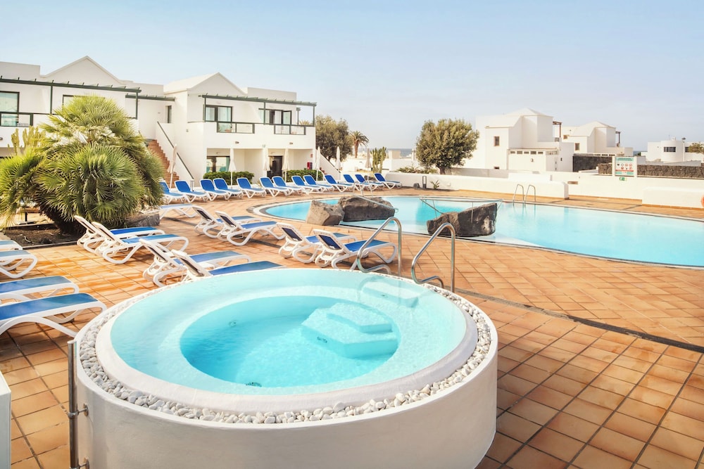 Hotel Pocillos Playa — Swimming pool in Puerto del Carmen, Canary Islands