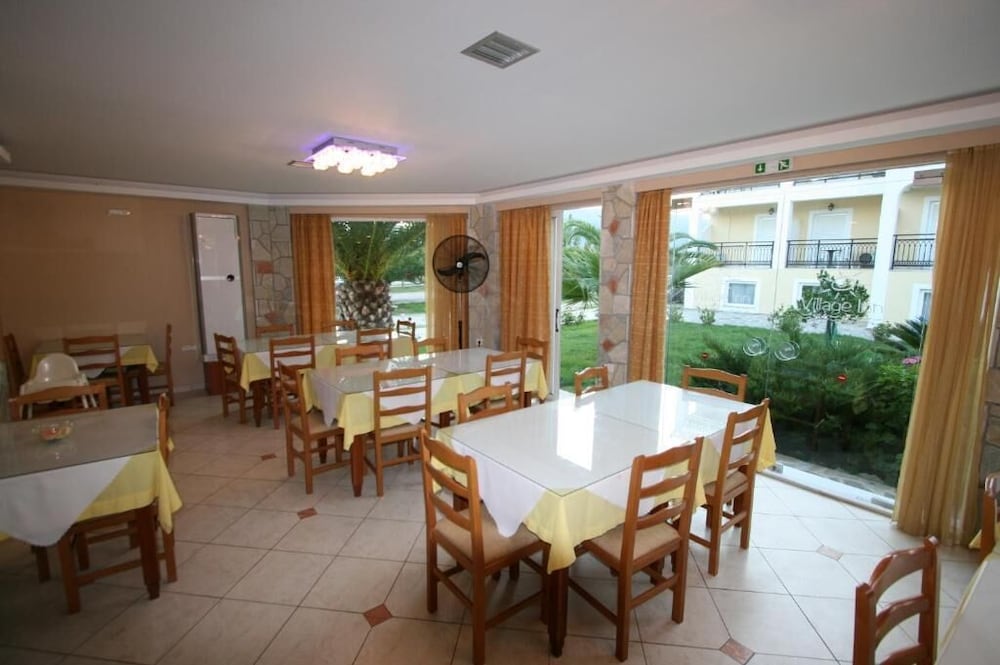 Village Inn Studios & Family Apartments — Restaurant & bars in Laganas, Ionian Islands