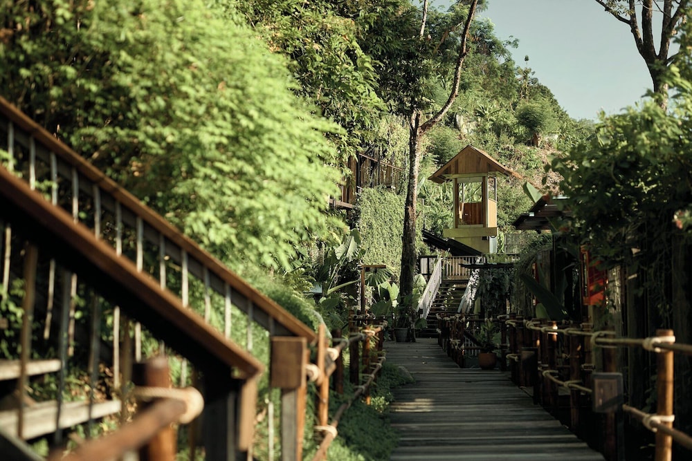 Dinso Resort & Villas Phuket, Vignette Collection by IHG — Hotel building in Patong Beach, Phuket Province