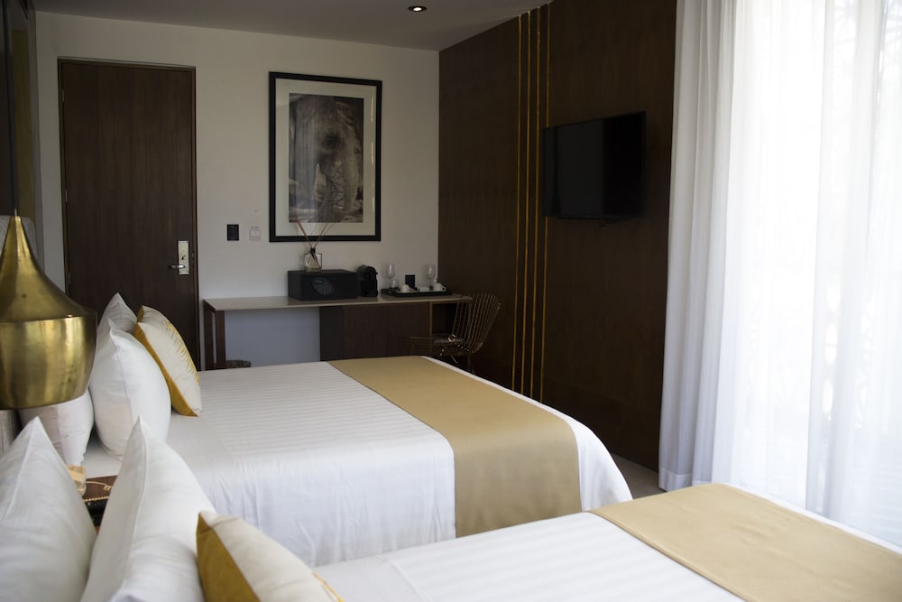 IT Boutique Hotel & Restaurant — Rooms in Playa del Carmen, Quintana Roo