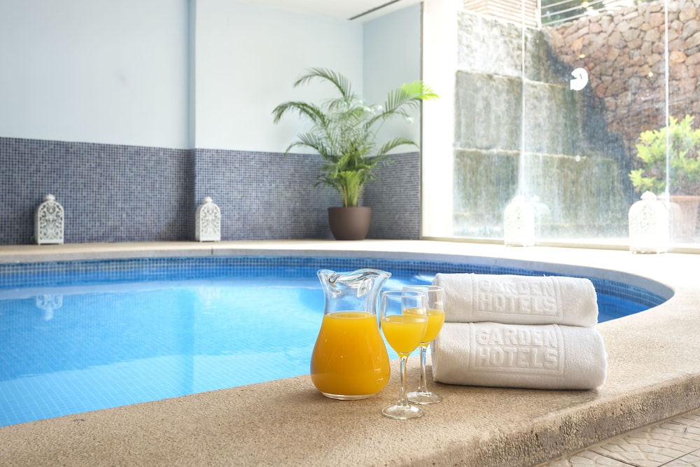 Aparthotel Tropic Garden — Swimming pool in Santa Eulalia, Balearic Islands