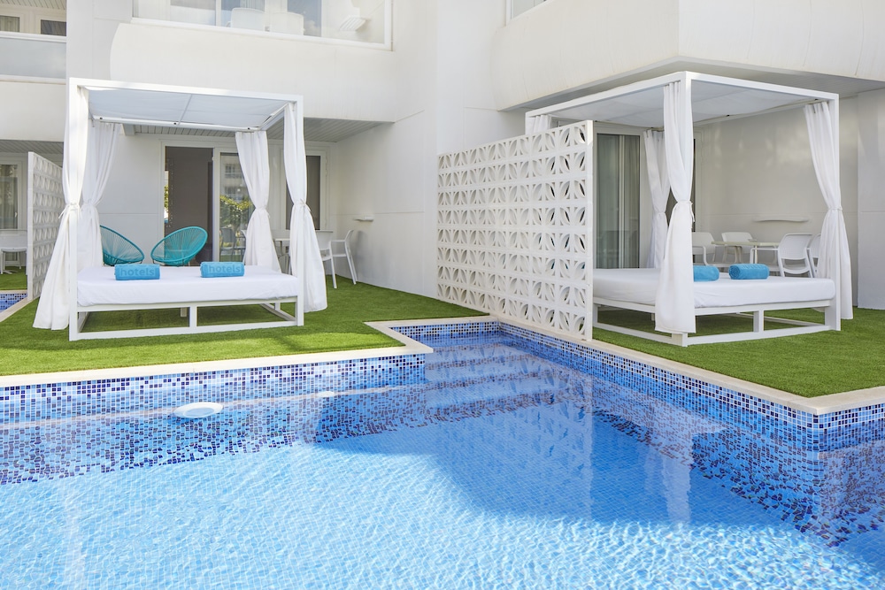 Aparthotel Tropic Garden — Swimming pool in Santa Eulalia, Balearic Islands