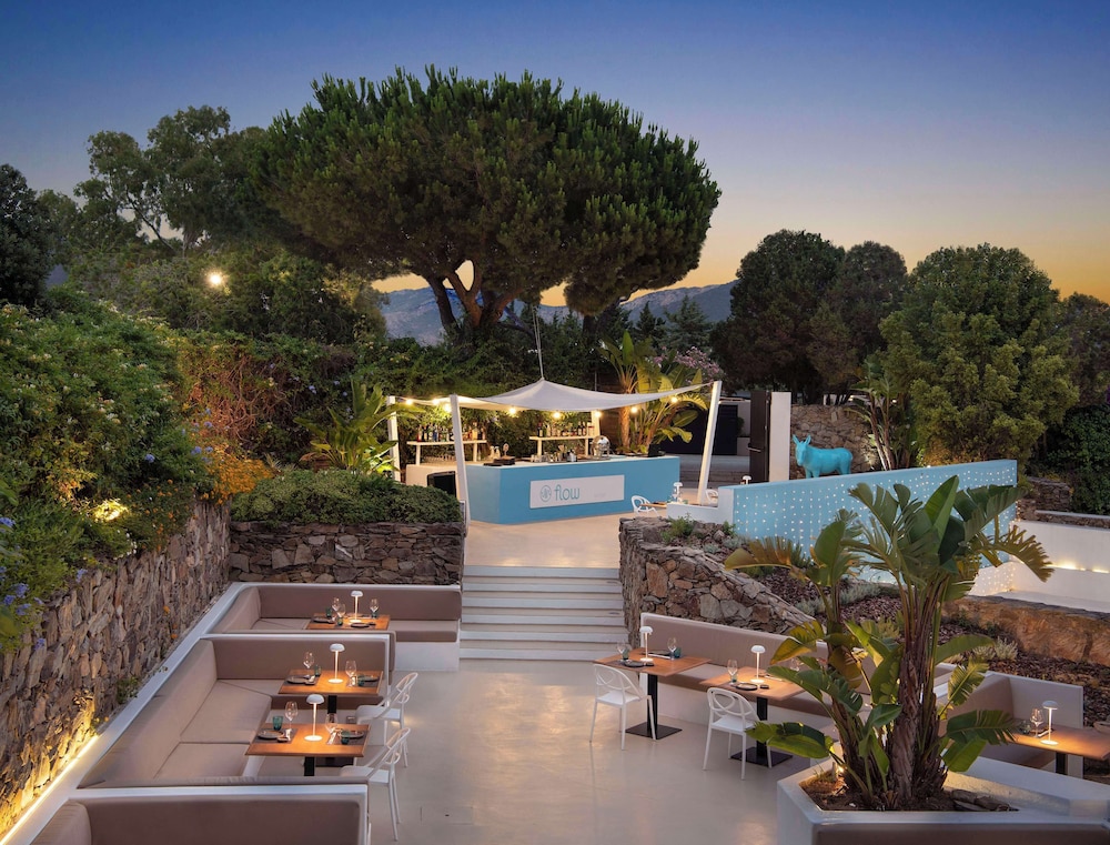 Baia di Chia Resort Sardinia, Curio Collection by Hilton — Restaurant & bars in Domus de Maria, Sardinia