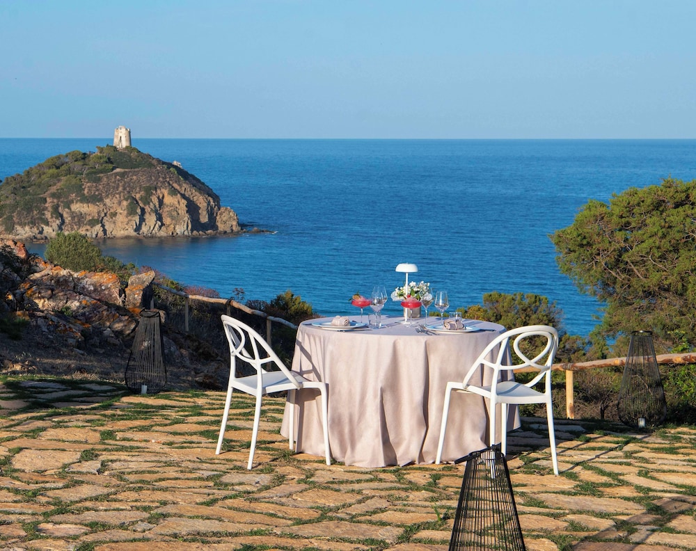 Baia di Chia Resort Sardinia, Curio Collection by Hilton — Restaurant & bars in Domus de Maria, Sardinia