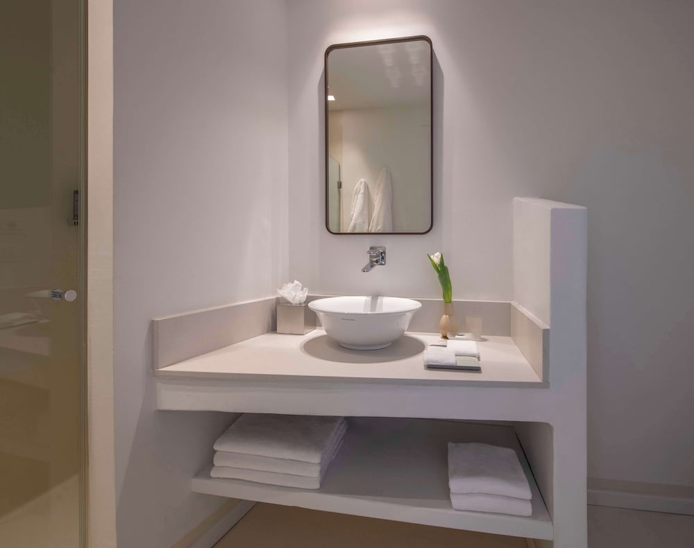 Baia di Chia Resort Sardinia, Curio Collection by Hilton — Hotel rooms in Domus de Maria, Sardinia