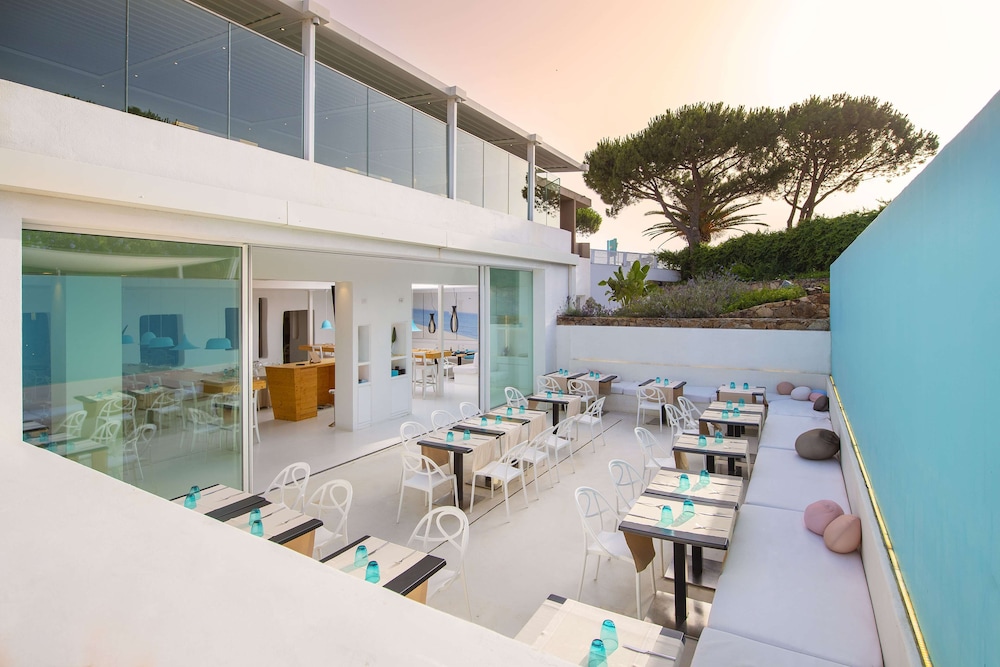 Baia di Chia Resort Sardinia, Curio Collection by Hilton — Restaurant & bars in Domus de Maria, Sardinia